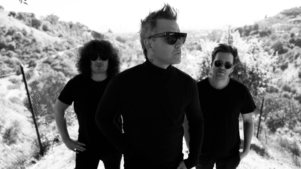 Black and white photo of Robbie Williams' dance music trio, Lufthus