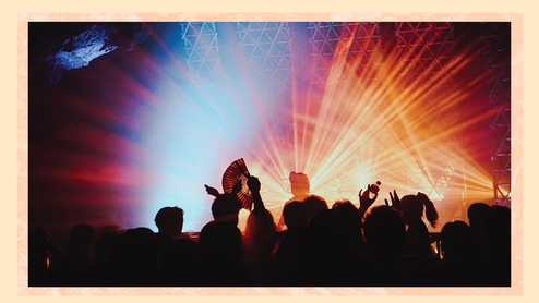 Photo of a crowd with colourful lights at Vietnam’s Equation Festival