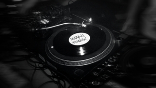 Black-and-white close-up of dubplate reading Imani Remix