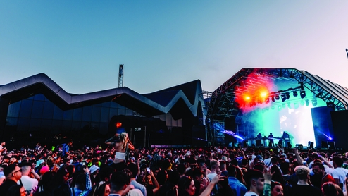 The Riverside museum and festival mainstage at dusk