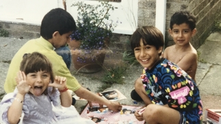 Photo of four children playing outside